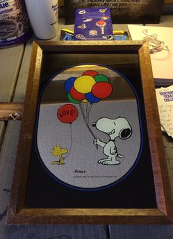 Collectible Snoopy and Woodstock mirror