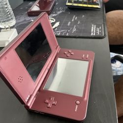 NINTENDO DSi XL HANDHELD CONSOLE BURGUNDY (UTL-001) USED.ITEM IS USED WITH COSMETIC SURFACE SCRATCHES ON SCREEN AND ALSO COSMETIC WEAR ON BODY, PLEASE