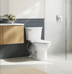 American Standard Champion Two-Piece 1.28 GPF Single Flush Elongated Chair Height Toilet with Slow-Close Seat in White