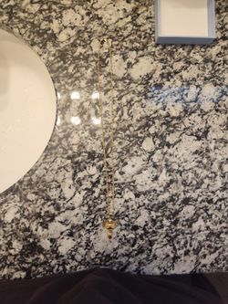 10k gold rope chain with angel pendant
