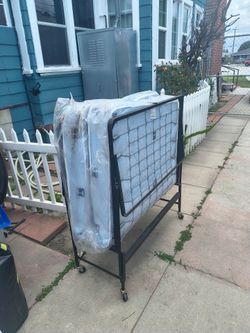 Brand new still with plastic over mattress