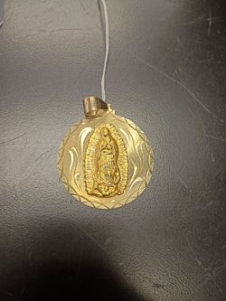 14 karat San Guadalupe yellow gold pendant