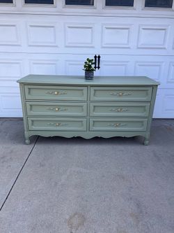 Sage green dresser with gold hardware