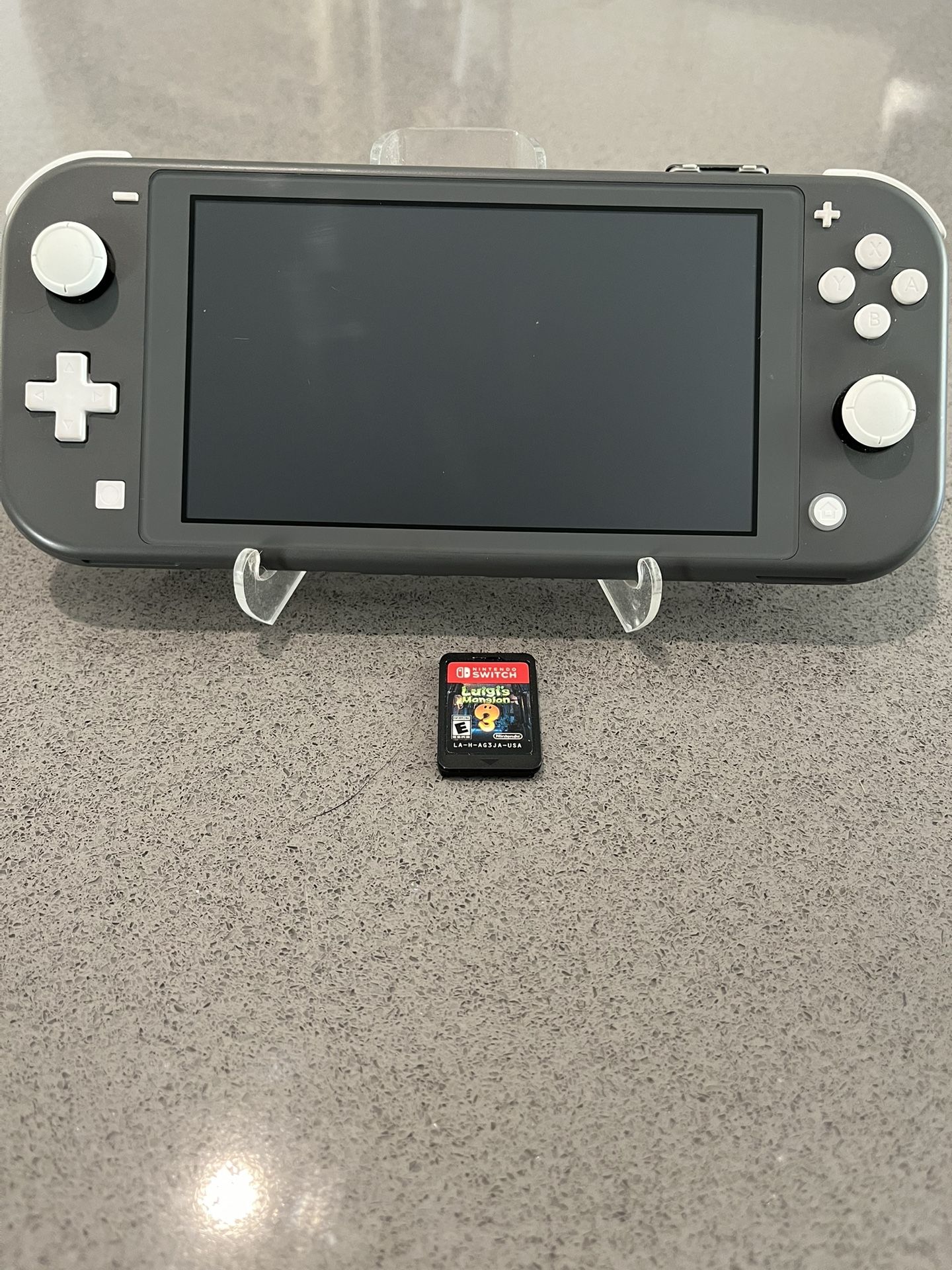Nintendo Switch Lite (Gray) + Luigi’s Mansion 3