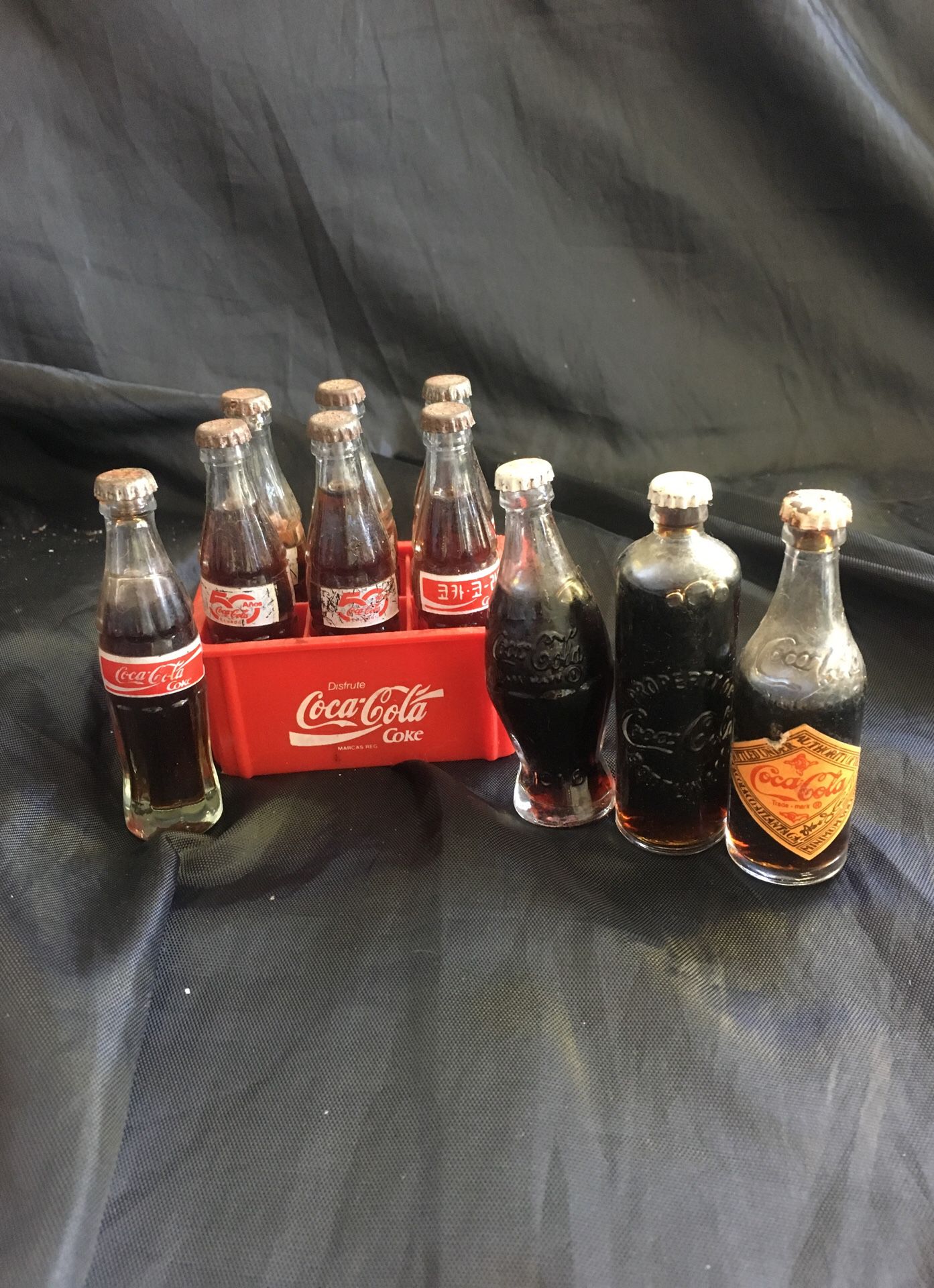 Collectible Coca Cola small glass bottles