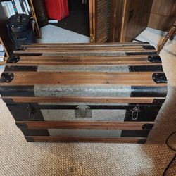 Antique Victorian dome top steamer trunk. Wood, metal and leather.