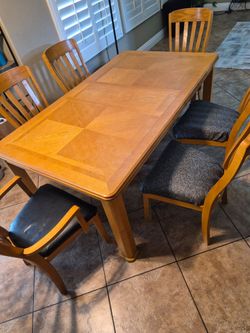 Heavy dining table with chairs