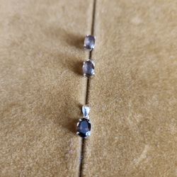Silver And Topaz Pendant And Earrings Set