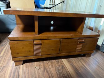 TV stand with two drawers at bottom