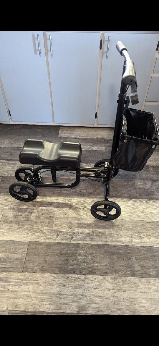 Scooter , It Is Adjustable Steerable With Brakes, Storage Bag, And Padding Extra- It Is Like New Used Very Little