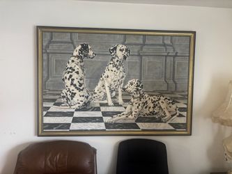 Three Dalmatians in marble floor