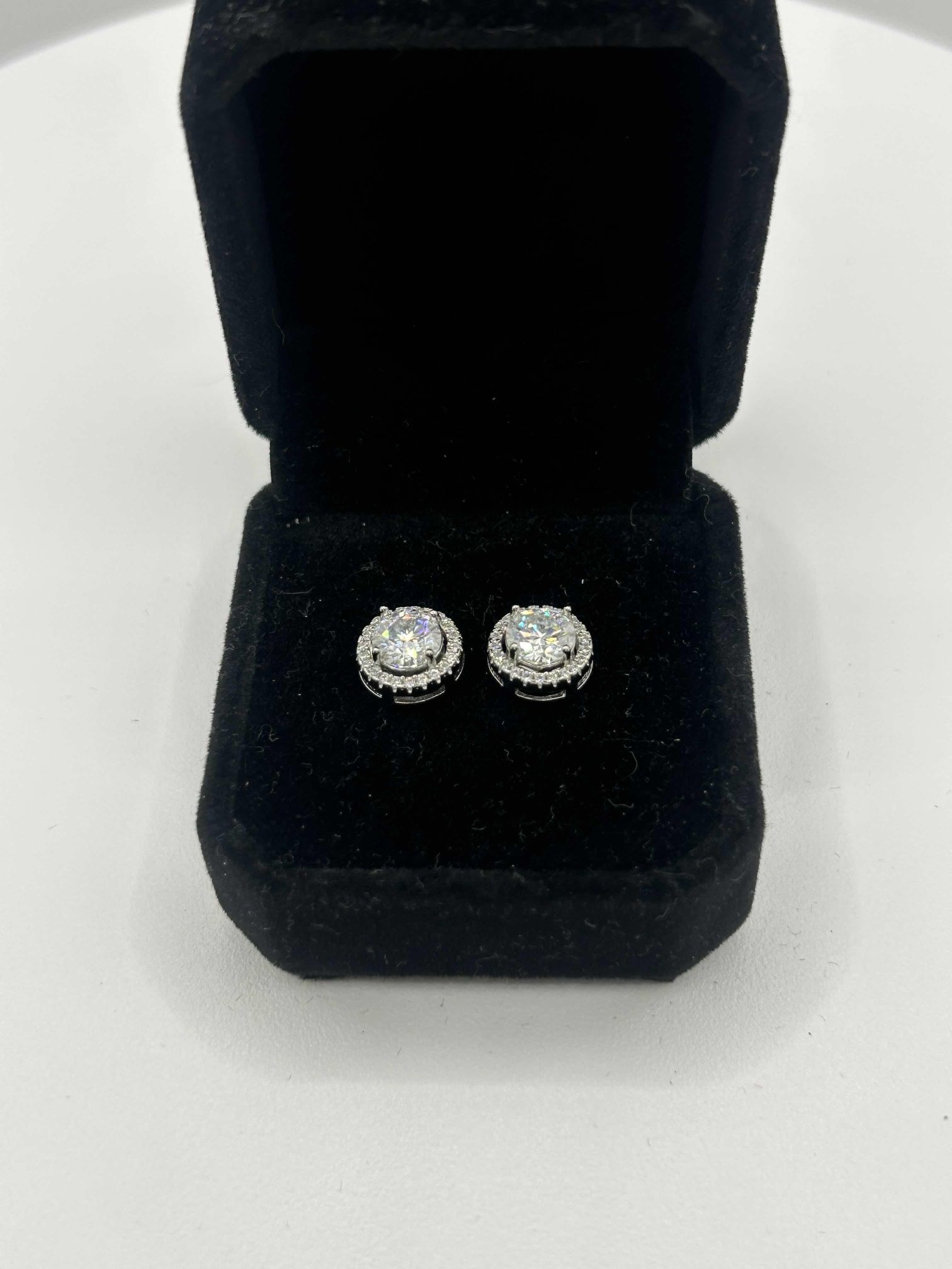 Diamond halo earrings 1 Carat Each 