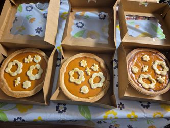 Pumpkin pies with Halloween cutouts