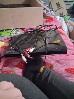Sony DVD player.\nWith the red , white and yellow cord and an h d m I 8k cord