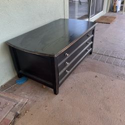 Coffee table with drawers