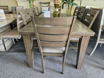 Brand new gray dining set with 6 chairs (table: 42" X 64"-82" X 30.2"H)