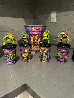 Movie exclusive TMNT drinking cups and metal popcorn bucket