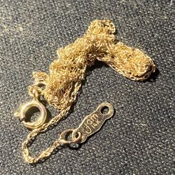 14k gold, about 18inches long