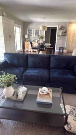 Navy blue suede sofa