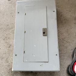 GE TLM2412CCU model, a 125 Amp, 24-space, 24-circuit panel 