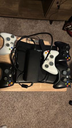 Xbox 360 plus Kinect w/ 14 games and 5 controllers