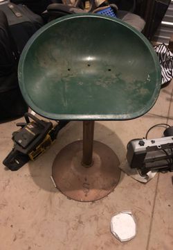 Old tractor seat stool.