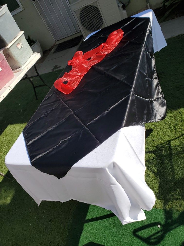 PARTY SUPPLIES TABLE COVERS AND BOWS....6 DOLLARS WHITE TABLE COVERS...4 DOLLARS MIDDLE SQUARES...75 CENTS EACH BOW...