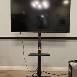 Tcl 50' TV and stand 