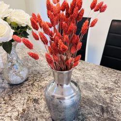Metal vase with real dried flowers