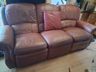 Matching leather recliner couch  and loveseat.