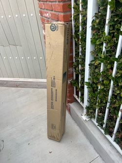 Curb Alert: Free box of new 4 foot fluorescent bulbs and a Coleman propane lantern
