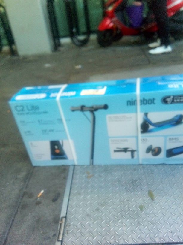 Never Opened In Box .Segway's NINEBOT C2 LITE KIDS eKickScooter