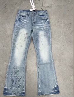 Purple Brand P004 monogram embossed slim flare jeans