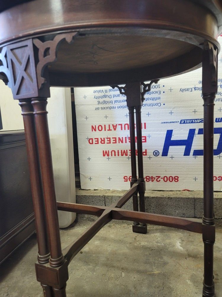 Round ornate Antique Table.
26.75w X 28h