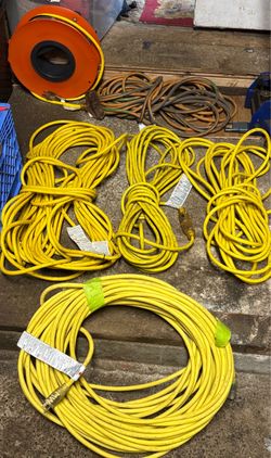 5 Heavy duty extension cords  $150 or possibly trade