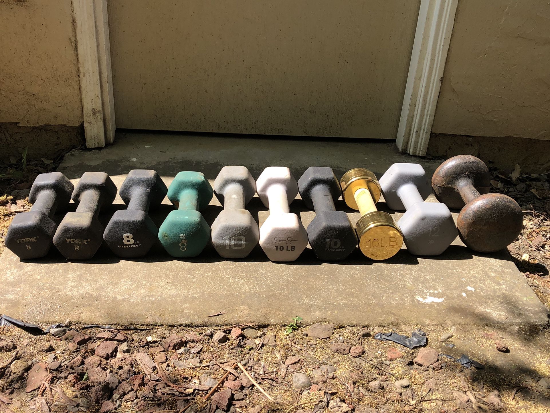 Several Dumbbell Weights for Sale