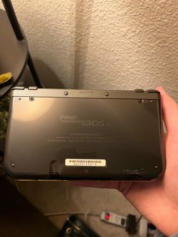 Nintendo New 3DS XL Black Handheld Console w/ Case + 4 games