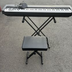 Yamaha 88-Key Digital Piano with stand and bench