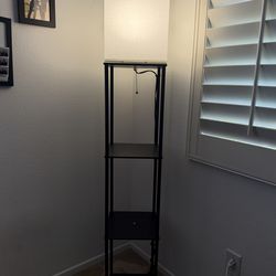 Floor lamp with shelves