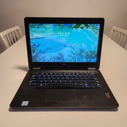 Dell Latitude E7470 laptop computer  13.3-inch 
Intel Core i7-6600U X2 2.6GHz 
8GB RAM
120GB SSD 
Windows 11 pro. Microsoft office installed.  Nothing