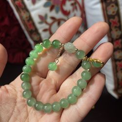 Auth jade bean bracelets brand new with sillk pouch