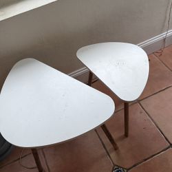 2 white coffee tables 