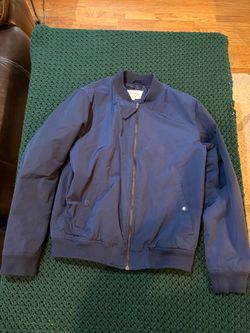 Blue windbreaker coat