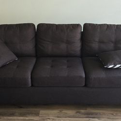 Brown couches and carpet