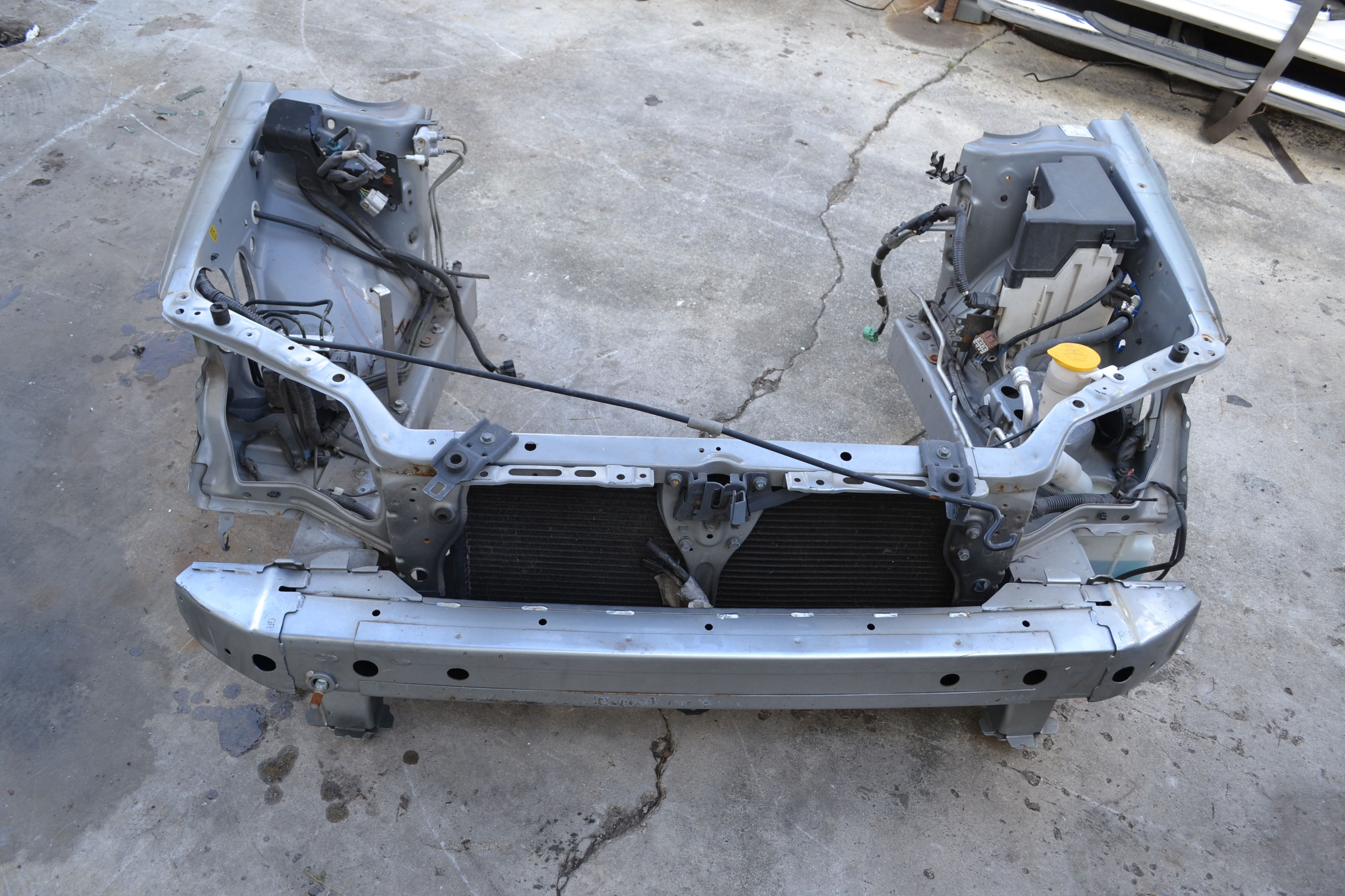 Torque Solution Subaru Radiator Stay Bracket | 2007-2007 Subaru WRX/STI (TS-SU-204B) main image 1