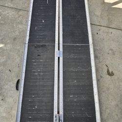 Portable wheelchair ramp 6ft long 30, 1/2 wide rated for 750 pounds.