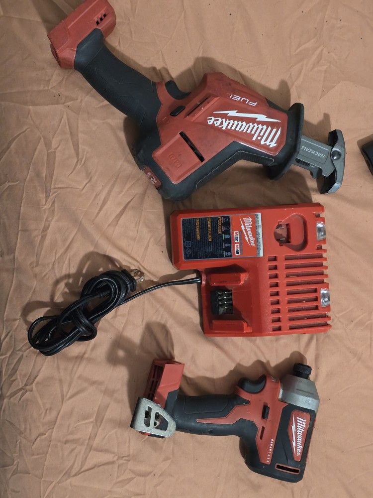 Milwaukee M18 FUEL Hakzall (zozo) charger and Impact drill