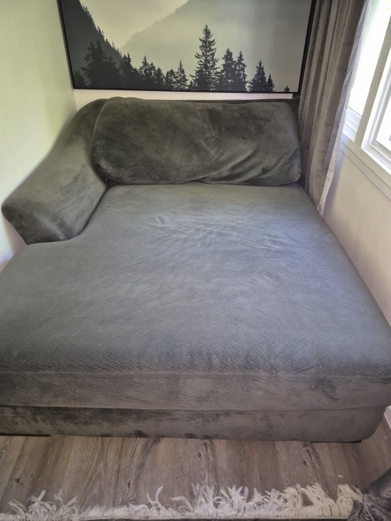 GREY SECTIONAL COUCH (LIVING SPACES)