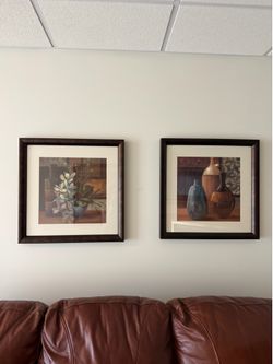 Two framed art prop