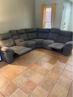 Grey Reclining Sectional Sofa with Console